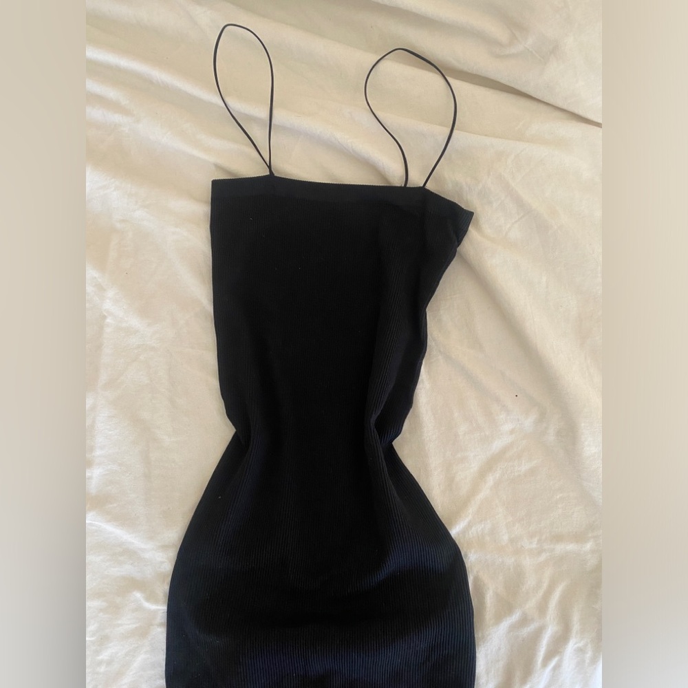 Urban Outfitters out from under black ribbed mini dress. Size XS/S.